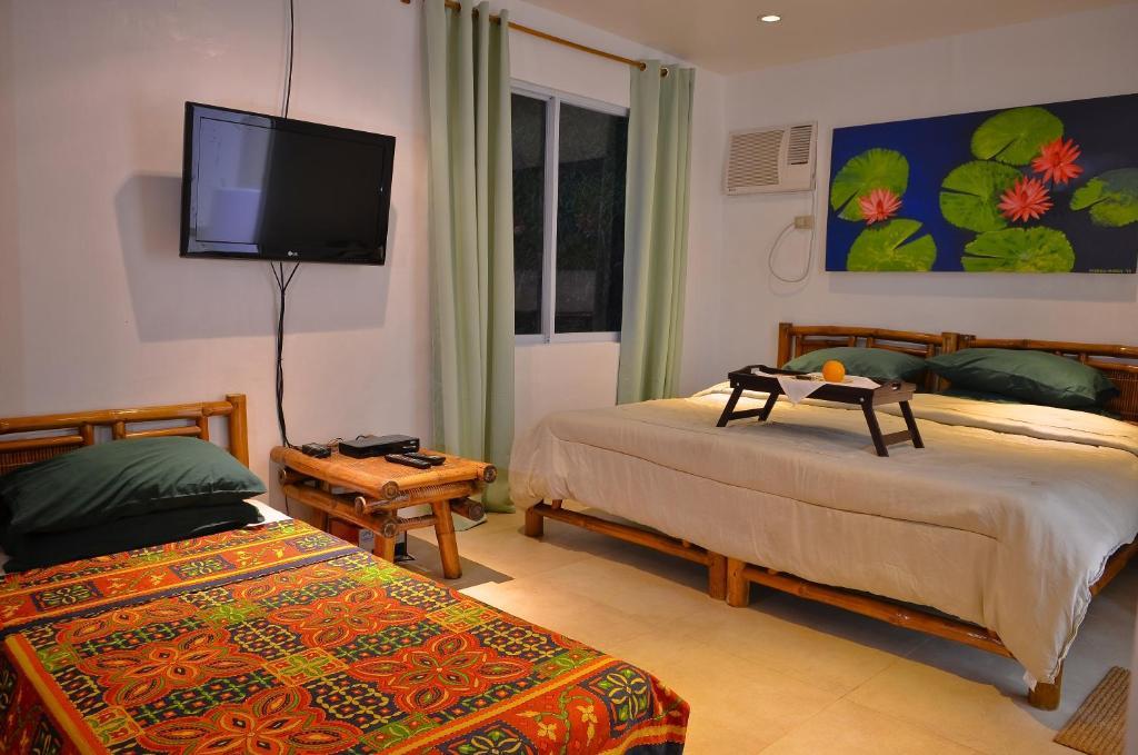 Punta Bulata White Beach Resort & Spa Cauayan  Room photo